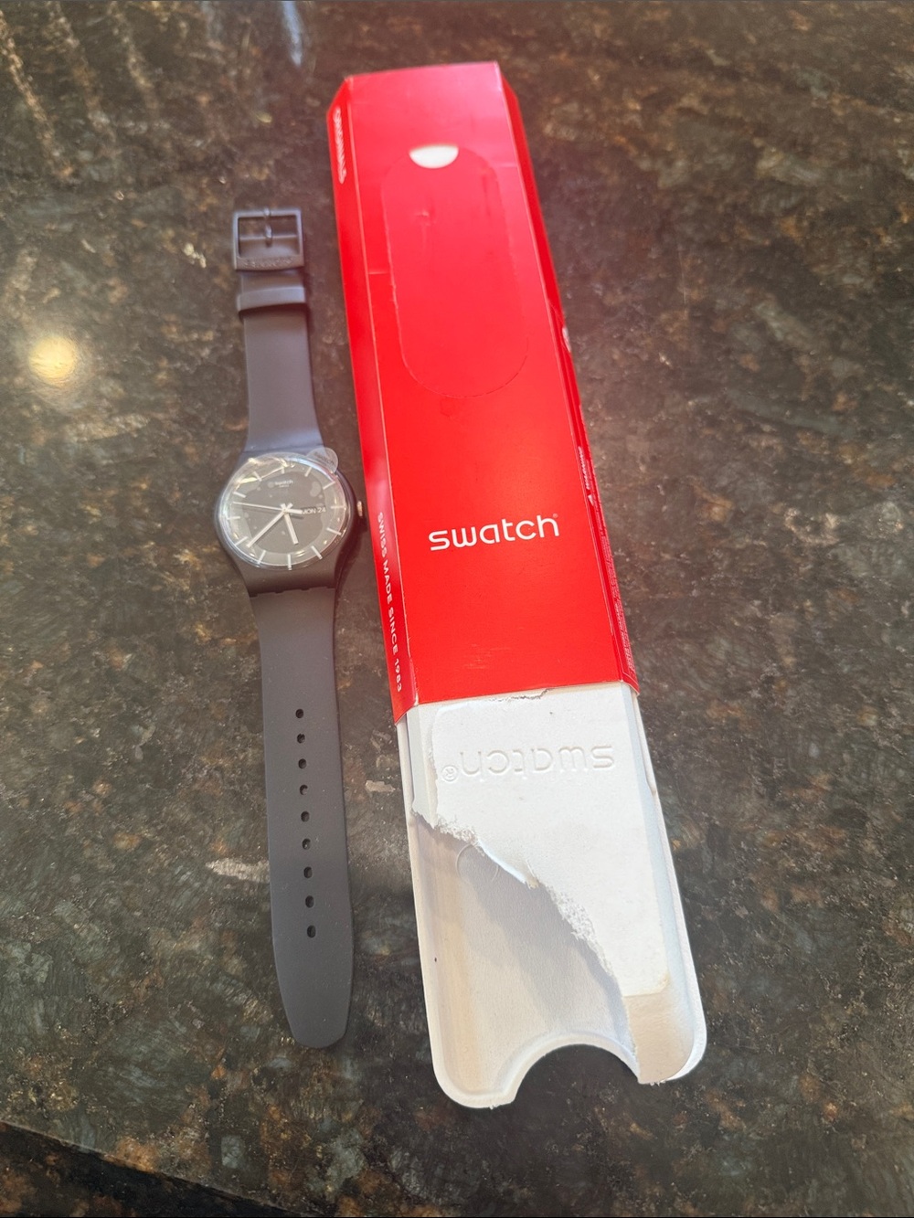 Swatch Black Silicone Strap Watch with Blackish/Grey dial.